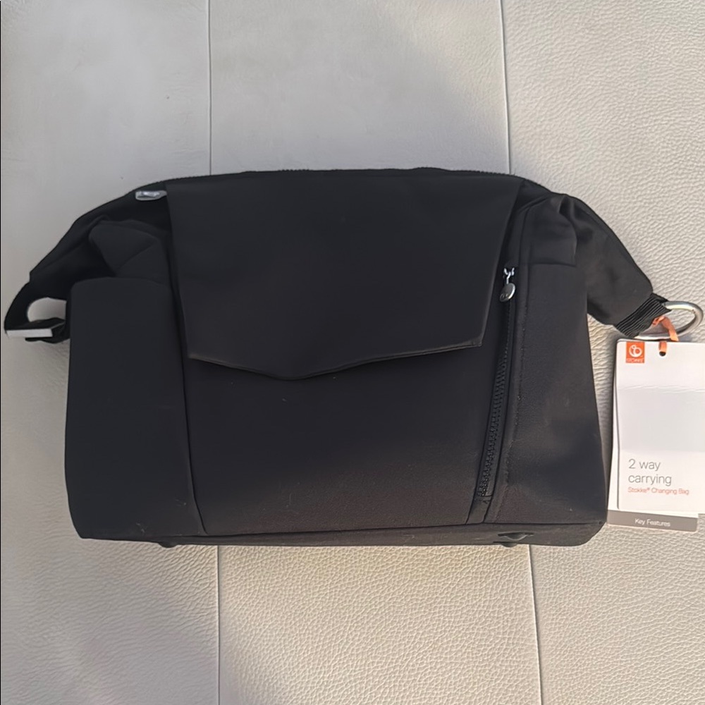 Stokke Changing bag with changing pad and diaper holder. Like new condition.